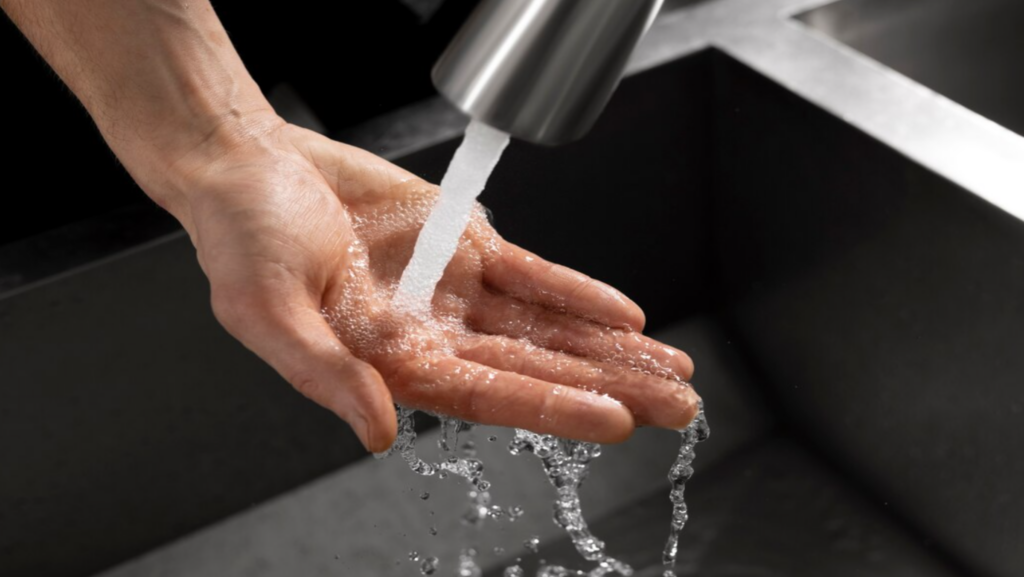 Washing your hands with water from a tankless water heater