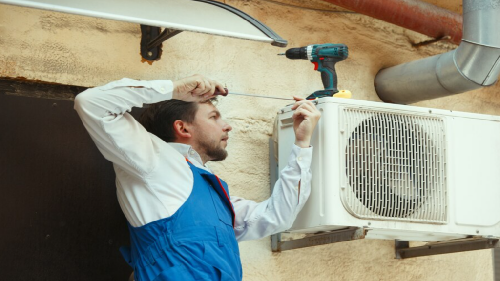 HVAC Technician Working on a Heat Pump